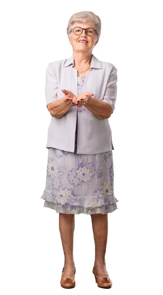 Full Body Senior Woman Holding Something Hands Showing Product Smiling — Stock Photo, Image