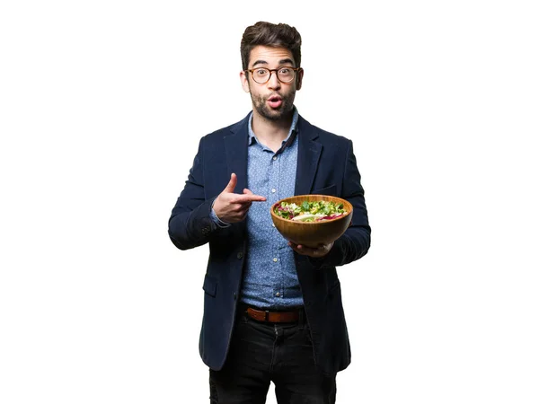 Joven Señalando Ensaladera Aislado Sobre Fondo Blanco — Foto de Stock