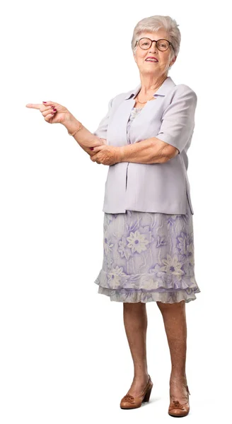 Full Body Senior Woman Pointing Side Smiling Surprised Presenting Something — Stock Photo, Image