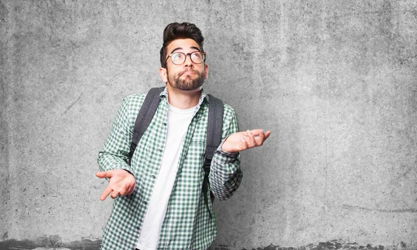 Dudando Estudiante Hombre Gris Fondo —  Fotos de Stock