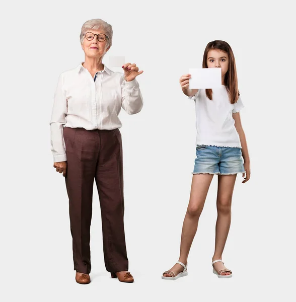 Full Body Elderly Lady Her Granddaughter Smiling Confident Offering Business — Stock Photo, Image