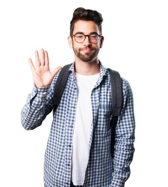 izole üzerinde beyaz arka plan selamlayan öğrenci adam