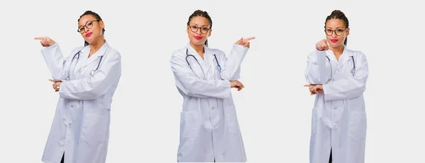 Set Young Black Female Doctor Pointing Side Gray Background — Stock Photo, Image