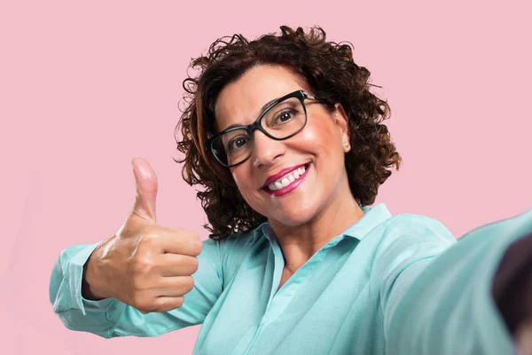 Middle Aged Woman Smiling Happy Taking Selfie Holding Camera Excited — Stock Photo, Image