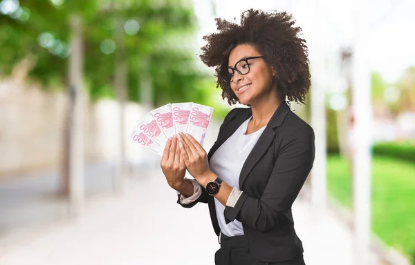 Black Business Woman Holding Money Bills Blurred Background — Stock Photo, Image