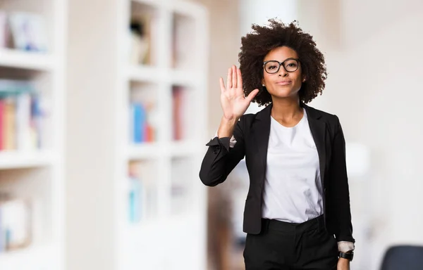 business black woman doing stop gesture