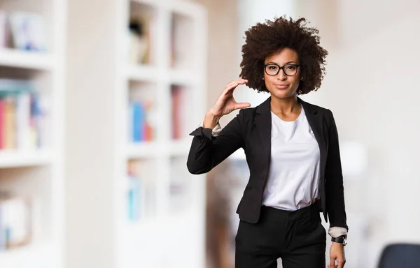 business black woman doing size gesture