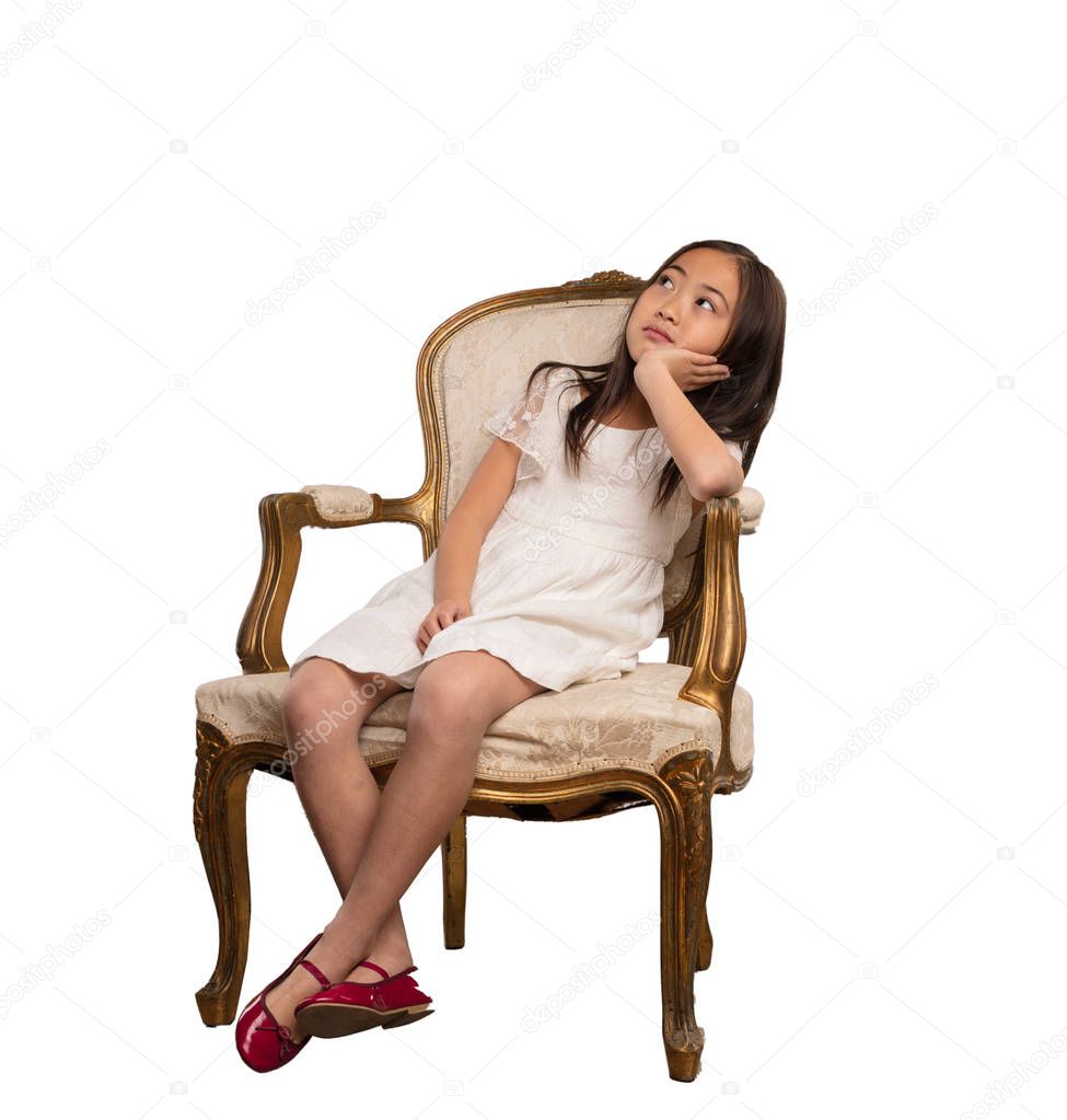  chinese little girl sitting on chair 