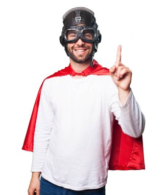 Beyaz arka plan üzerinde izole bir jest yapıyor süper kahraman