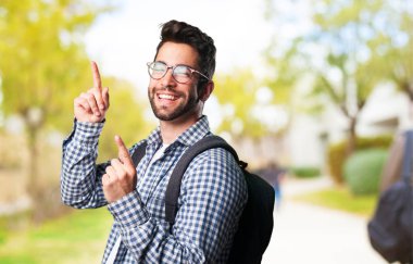 young man dancing on blurred background