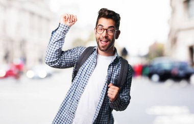 young man dancing on blurred background