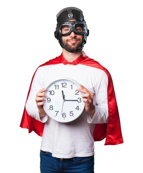 Super Héroe Sosteniendo Reloj Aislado Sobre Fondo Blanco — Foto de Stock