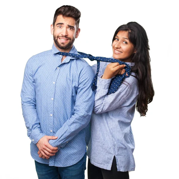 Young Woman Pulling Man His Tie — Stock Photo, Image