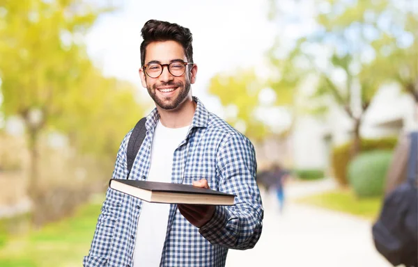 Student Bietet Ein Buch — Stockfoto