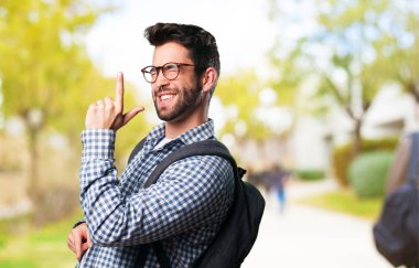 young man dancing on blurred background