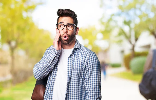 surprised student man outdoors