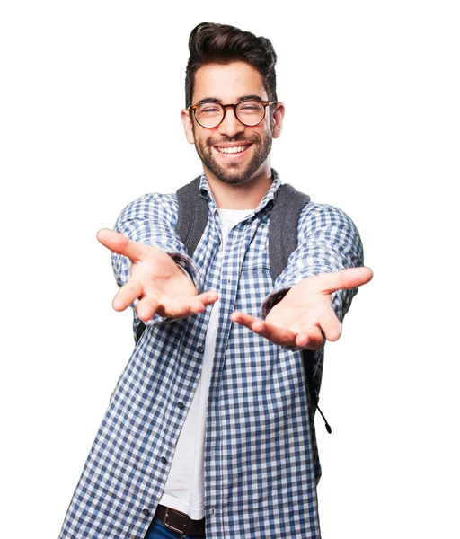 Student Mann Bietet Etwas Isoliertes Auf Weißem Hintergrund — Stockfoto