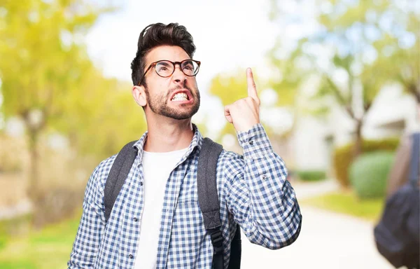 Estudiante Enojado Apuntando Espacio — Foto de Stock