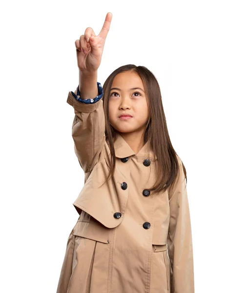 Chinese Little Girl Beige Trenchcoat Touching Screen Isolated White Background — Stock Photo, Image