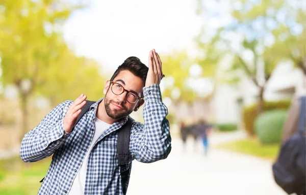 Young Man Combing Blurred Background — Stock Photo, Image