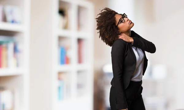 business black woman having back ache