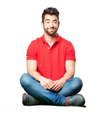 gülümseyen izole üzerinde beyaz arka plan oturan adam