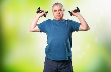 mature man doing exercise with dumbbell clipart
