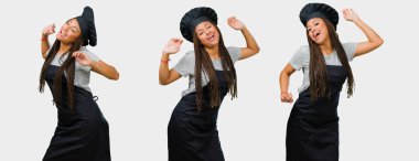 Dans ve having fun siyah üniformalı genç siyah kadın baker, ayarlı