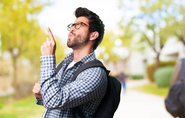 young man dancing on blurred background