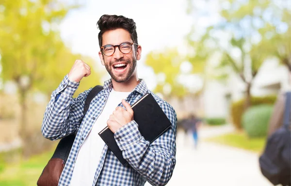 Student Hält Buch Der Hand — Stockfoto