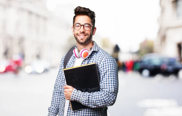 持有一本书的学生男子 — 图库照片