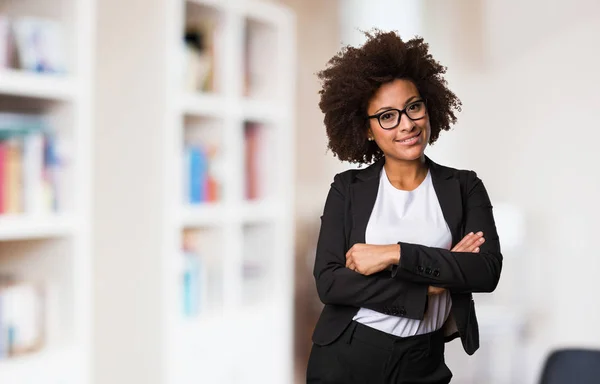 business black woman crossing arms