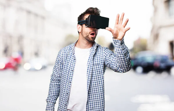 Joven Con Gafas Realidad Virtual Sobre Fondo Borroso —  Fotos de Stock