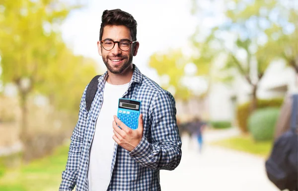 Student Man Holding Calculator — Stock Photo, Image