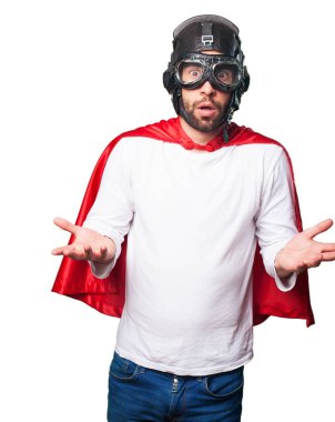 Beyaz arka plan üzerinde izole denge jest yapıyor süper kahraman