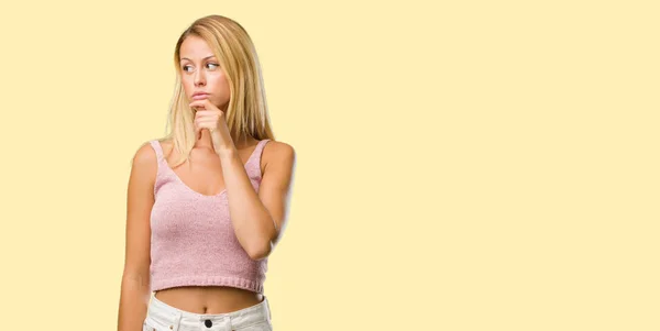 Portrait Young Pretty Blonde Woman Doubting Confused Thinking Idea Worried — Stock Photo, Image