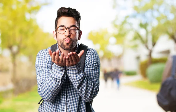 Jovem Homem Enviando Beijos Fundo Borrado — Fotografia de Stock