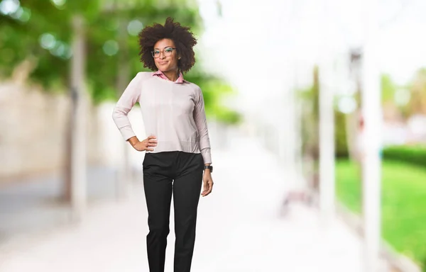 black woman standing full body, selective focus