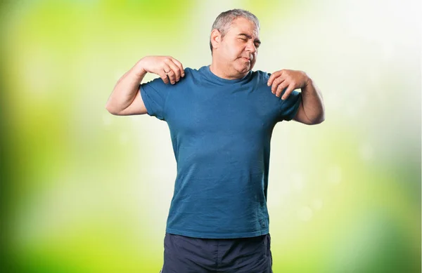 Tired Mature Man Green Blurred Background — Stock Photo, Image