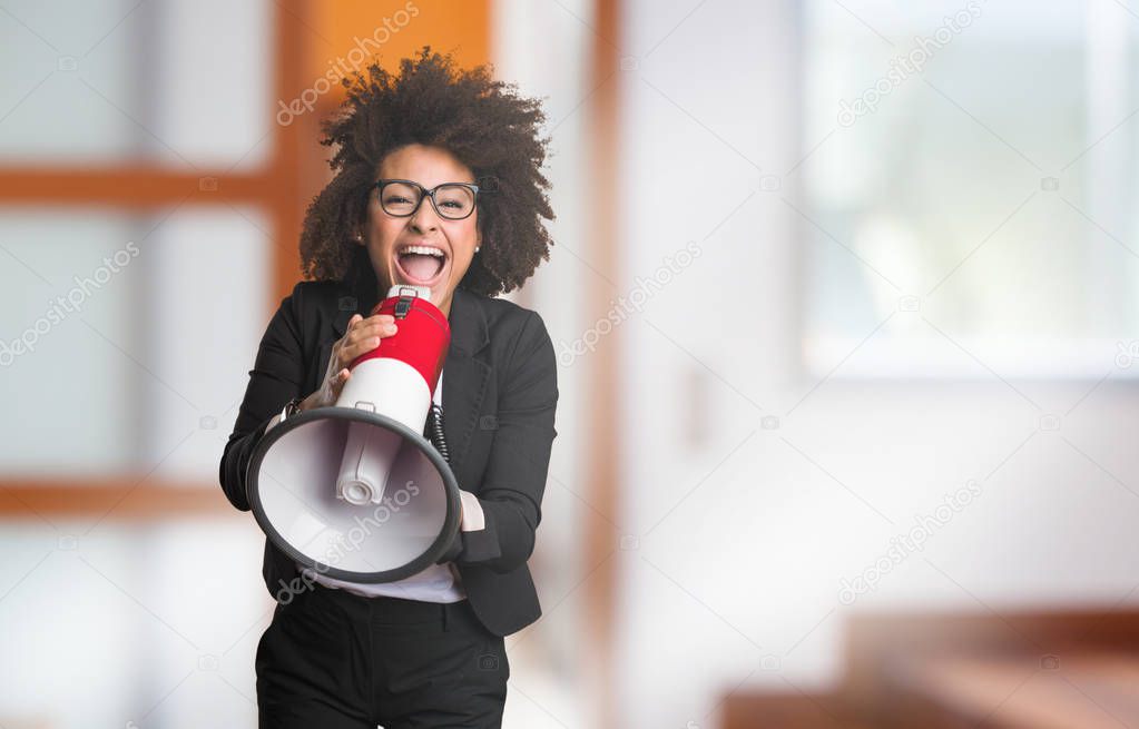 business black woman shouting on megaphone