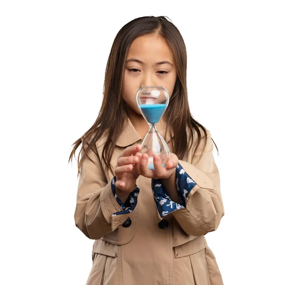 Chinese Little Girl Beige Trenchcoat Holding Sand Timer Isolated White — Stock Photo, Image