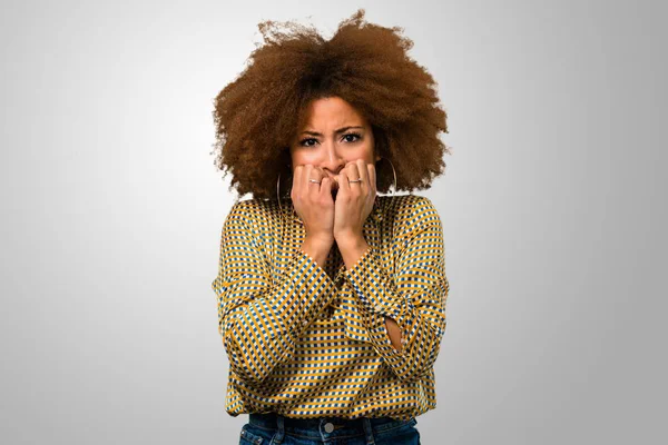 scared afro woman and frustrated