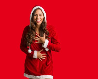 Full body young santa curvy woman laughing and having fun clipart