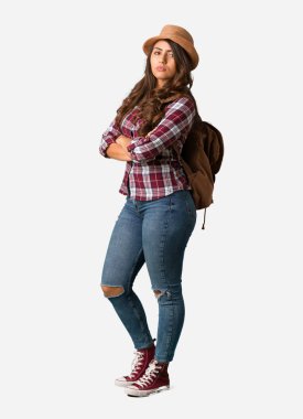 Full body young traveler curvy woman looking straight ahead clipart