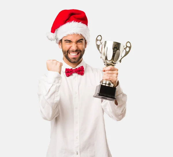 Man Santa Hat Holding Trophy — Stock Photo, Image