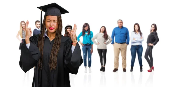 Young Graduated Black Woman Wearing Braids Crossing His Fingers Wishes — Stock Photo, Image