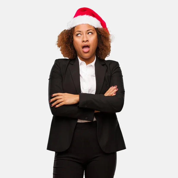Young Business Black Woman Wearing Chirstmas Santa Hat Tired Bored — Stock Photo, Image