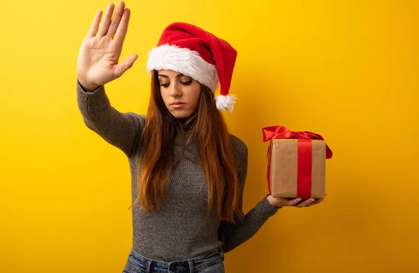 Young Pretty Woman Holding Gift Putting Hand Front — Stock Photo, Image