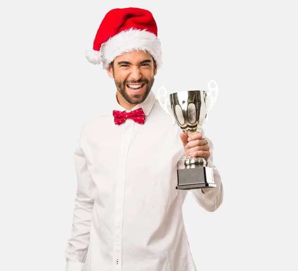 Man Santa Hat Holding Trophy — Stock Photo, Image