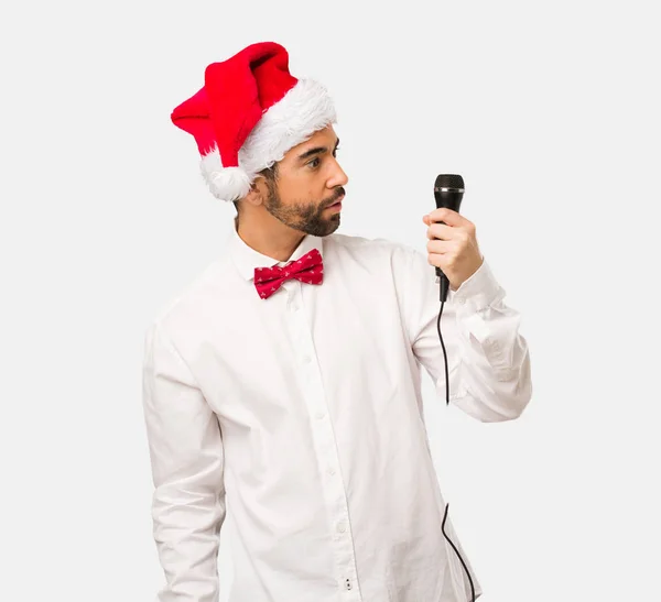 Man New Year Hat Singing Song Microphon — Stock Photo, Image